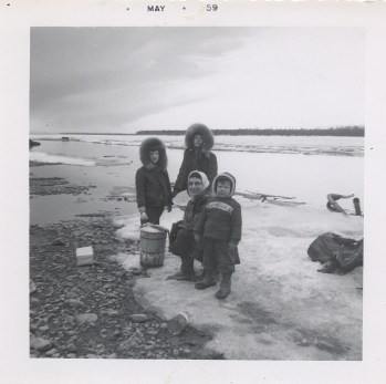 Ruby and children making icecream on Yukon 1959